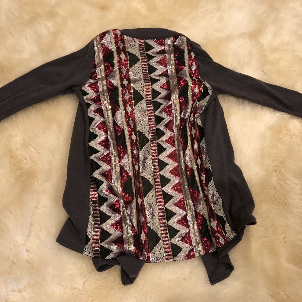 Cardigan sequined on the back